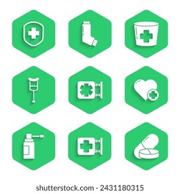 Set Medical symbol of the Emergency, Hospital signboard, Medicine pill or tablet, Heart with cross, bottle nozzle spray, Crutch crutches, Nurse hat and shield icon. Vector