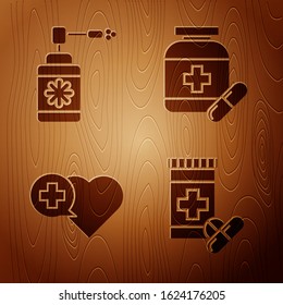 Set Medicine bottle and pills, Medical bottle with nozzle spray, Heart with a cross and Medicine bottle and pills on wooden background. Vector
