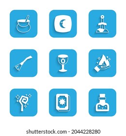 Set Medieval goblet, Tarot cards, Bottle with potion, Hand holding fire, Magic staff, Witches broom, Sword the stone and cauldron icon. Vector