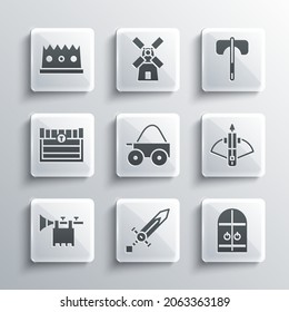 Set Medieval sword, castle gate, Battle crossbow with arrow, Wooden four-wheel cart, Trumpet flag, Antique treasure chest, King crown and axe icon. Vector