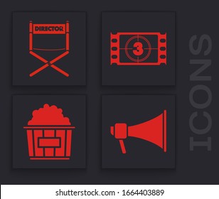 Set Megaphone , Director movie chair , Play Video  and Popcorn in cardboard box  icon. Vector