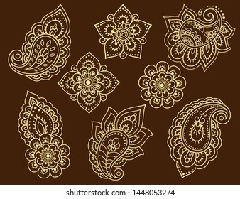 Conjunto de motivos florales de Mehndi para el dibujo y tatuaje de Henna. Decoración de estilo étnico oriental e indio. Ornamento de perro. Dibujo manual de esquema de ilustración vectorial.