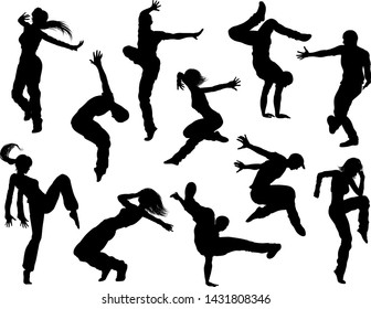 A Set Of Men And Women Street Dance Hip Hop Dancers In Silhouette