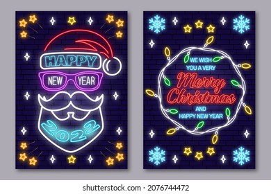 Set of Merry Christmas and 2022 Happy New Year posters in neon style. Collection of neon signs, design template, brochure, glowing poster. Bright neon advertising of xmas, Christmas and new year