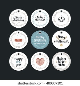 Set of Merry Christmas and Happy New year tags with hand drawn font and holiday decoration elements. Xmas gift tags isolated on black background