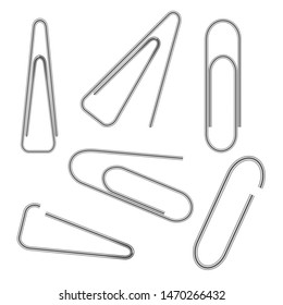 set of metallic paper clips isolated on white background