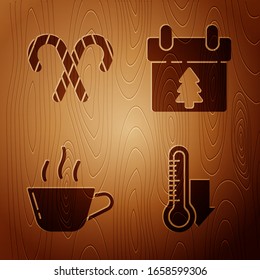 Set Meteorology thermometer measuring, Christmas candy cane with stripes, Coffee cup and Calendar on wooden background. Vector