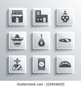 Set Mexican carpet, Taco with tortilla, Cigar, guitar, man sombrero, Huehuetl and Burning candle on skull icon. Vector