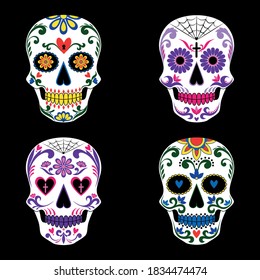 A set of Mexican skulls, decorated with colorful decorative elements. The day of the Dead.