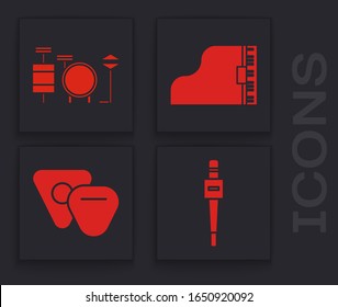 Set Microphone, Drums, Grand piano and Guitar pick icon. Vector