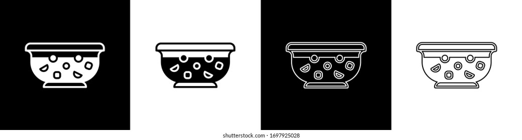 Set Mixed punch with fresh fruits in bowl icon isolated on black and white background.  Vector Illustration