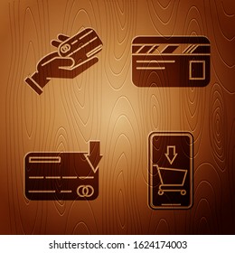 Set Mobile phone and shopping cart, Human hand holding with credit card, Credit card and Credit card on wooden background. Vector