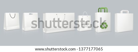 Set of mockup of realistic white paper bag with logotype. Corporate identity blank packaging, shopping bag paper mockup. Branding packaging template with handles. Gift boxing. Vector illustration.