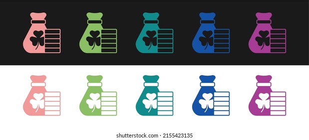 Set Money bag with clover trefoil leaf icon isolated on black and white background. Happy Saint Patricks day. National Irish holiday.  Vector