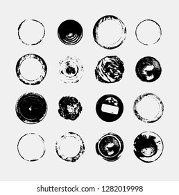 Set of monochrome abstract vector grunge round textures.