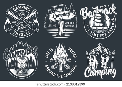 Set of monochrome camping and travel emblems, including campfire, flag, wood, lantern, forest