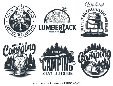 Set of monochrome camping and travel emblems, including campfire, flag, wood, lantern, forest