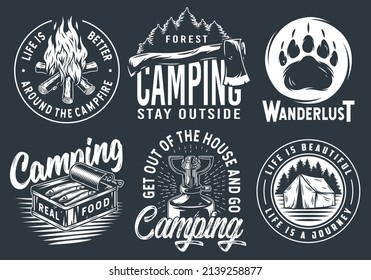 Set of monochrome camping and travel emblems, including campfire, flag, wood, lantern, forest