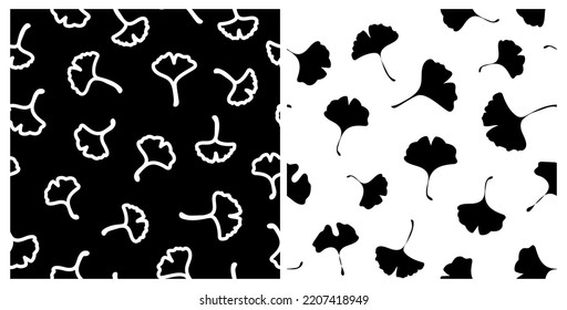 Set of monochrome ginkgo biloba leaves seamless repeat pattern. Random placed, vector botanical all over surface prints on white and black backgrounds.