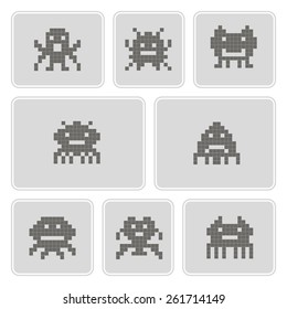 set of monochrome icons with pixel alien monsters