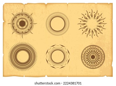 A set of monochrome symbols of the sun on old yellow parchment
