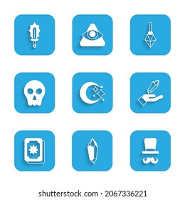 Lege den Mond und die Sterne, den Zauberstein, den Zauberer, die Tarot-Karten, den Schädel und das Schwert in das Feuersymbol. Vektorgrafik