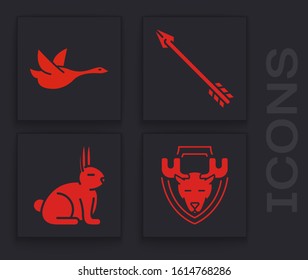 Set Moose head on shield, Flying duck, Hipster arrow and Rabbit icon. Vector