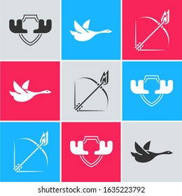 Set Moose horns on shield, Flying duck and Bow and fire arrow icon. Vector