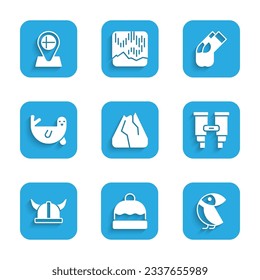 Set Mountains, Beanie hat, Albatross, Binoculars, Viking horned helmet, Fur seal animal, Socks and Location flag Iceland icon. Vector