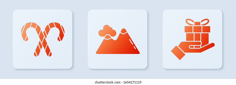 Set Mountains, Christmas candy cane with stripes and Gift box in hand. White square button. Vector
