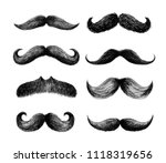 Set of moustaches. Hand drawn black mustache for barbershop or mustache carnival. Freehand drawing. Vector illustration. Isolated on white background