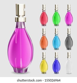 Set of multicolored bottles of perfume on white background