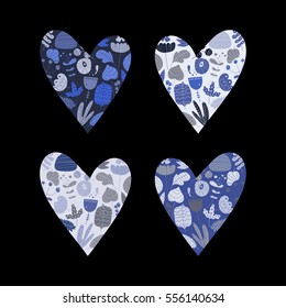 Set of multicolored hearts filled with hand draw flowers and plants. Valentine's Day design elements.