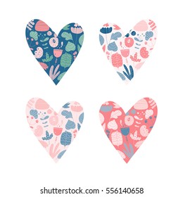 Set of multicolored hearts filled with hand draw flowers and plants. Valentine's Day design elements.