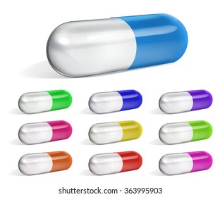 Set of multicolored oblong capsules with shadows on white background