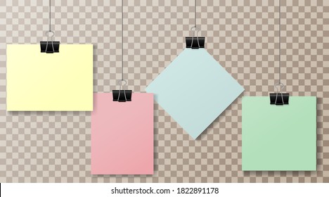 A set of multicolored pieces of paper and office clips on a transparent background. Clothespin on a transparent background. Colored pieces of paper. Set.Vector illustration