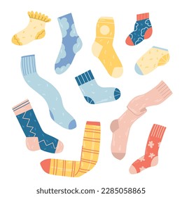 Set of multi-colored socks and stockings on a white background. Adult and children s socks