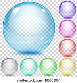 Set of multicolored transparent glass spheres on a plaid background