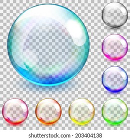 Set Of Multicolored Transparent Glass Spheres On A Plaid Background