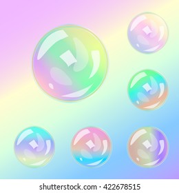 Set of multicolored transparent glass spheres on a plaid background