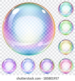 Set of multicolored transparent soap bubbles on a plaid background