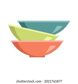 A set of multicoloured plates standing on top of each other. Pile of empty food bowls, soup dishes