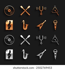 Set Musical instrument saxophone, Triangle, Microphone, Electric bass guitar, Treble clef, tuning fork, Vinyl disk and Drum sticks icon. Vector