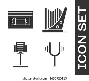 Set Musical tuning fork, VHS video cassette tape, Music stand and Harp icon. Vector