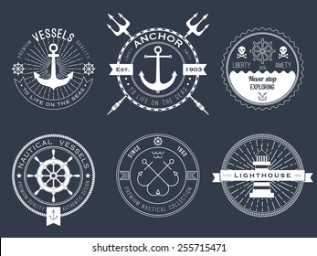 Set of nautical logos, badges and labels on blackboard