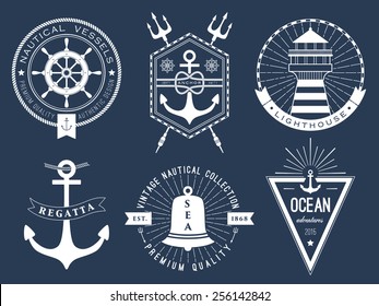 Set of nautical logos, badges and labels on blackboard