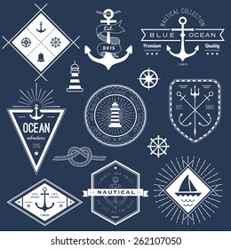 Set of nautical logos, badges and labels on blackboard