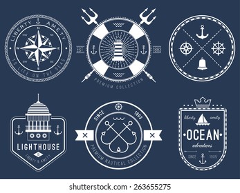 Set of nautical logos, badges and labels on blackboard