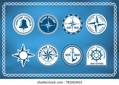 Set of nautical and marine badges and signs with windrose, anchor and steering wheel