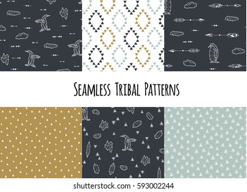 Set of navajo tribal patterns with low poly penguins.